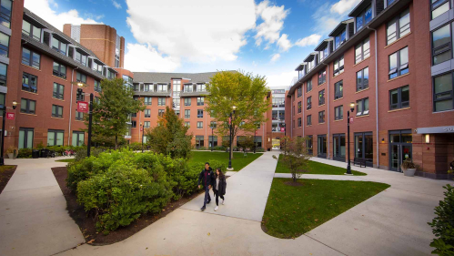 Students walking across a campus