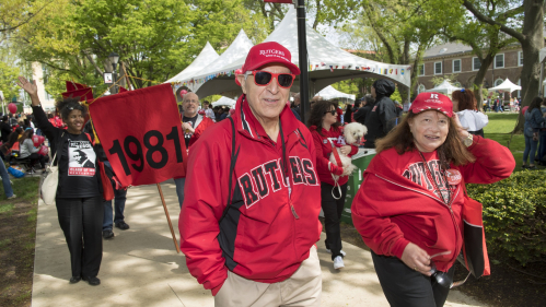Alumni and friends march in the Alumni Parade at Rutgers Day