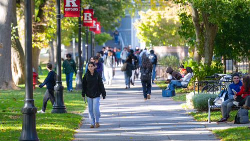 students walking on College Ave. campus