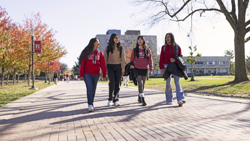 female students walking on campus