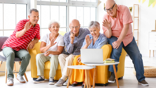 older adults using an iPad for a video call