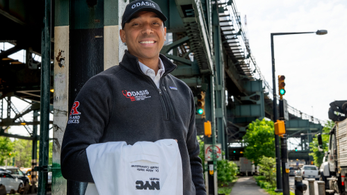 Dr. Alister Martin SAS ’10, the commissioner of the New York City Department of Health and Mental Hygiene, poses outside his office in Queens, N.Y. He credits his career in medicine to the Office for Development and Academic Success (ODASIS)