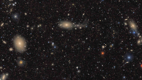 Stars and galaxies against the black background of outer space