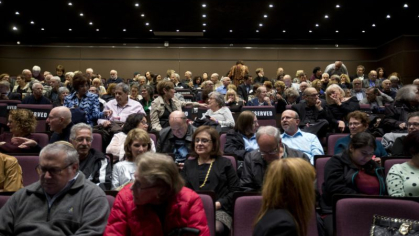 crowd watching a film
