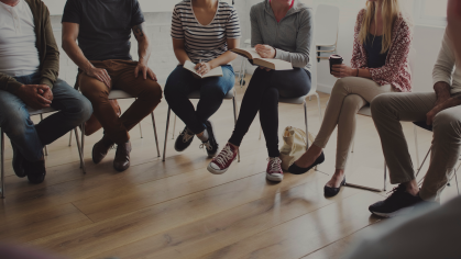 People sitting in a circle counseling