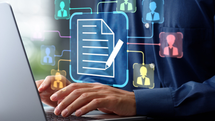Close-up of hands on a laptop keyboard with colorful digital icons of a document and connected people, indicating collaboration and information sharing