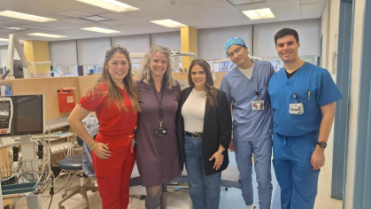 Representatives from Rutgers School of Dental Medicine and Crossroads School pose for a photo at the school's Brunsden-Villa Pediatric Dental Center.