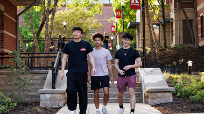 Three students walking