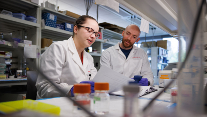 graduate students working in a lab