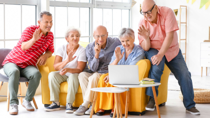 older adults using an iPad for a video call