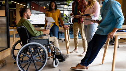 Stock art that shows a person in a wheel chair in the workforce 