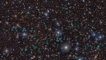 A field of stars, some of which have blue circles around them