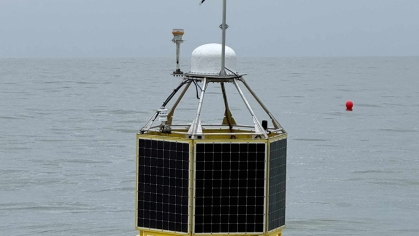 A Rutgers research buoy floats on the surface of the Atlantic Ocean.