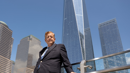 Original Caption: Angus Gillespie, author of the 1999 book Twin Towers: The Life of New York City's World Trade Center, poses in front of the new One WTC. 