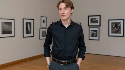 Rutgers University-New Brunswick student Reece Goodson stands in a gallery at the Zimmerli at Rutgers-New Brunswick.