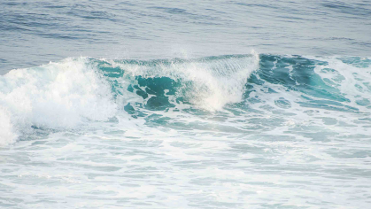 Choppy seas with a big wave at the center