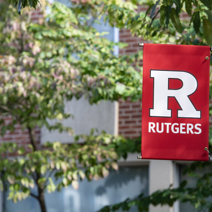 A scarlet red banner bearing the Rutgers University "block R"