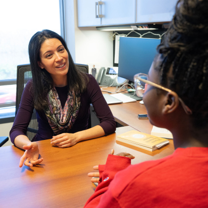 An advisor meeting with a student