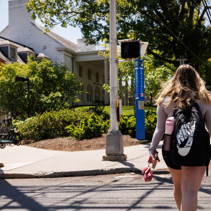 student walking on Cook campus