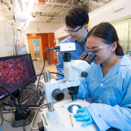 two students in a lab