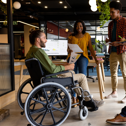 Stock art that shows a person in a wheel chair in the workforce 