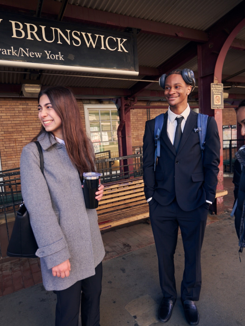 Isabella Esposito, Vedika Kulkarni, and Stephan Riche waiting for the train at the New Brunswick Train Station