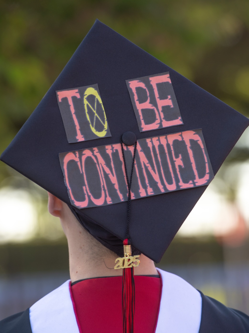 Decorated mortarboards convey personal messages from graduates at the Rutgers 259th anniversary Commencement on Sunday, May 18, 2025.