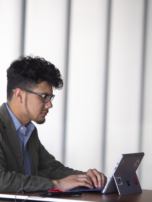 A student working on a tablet