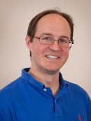 Wade Trappe in a blue collared shirt