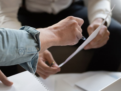People looking at paperwork