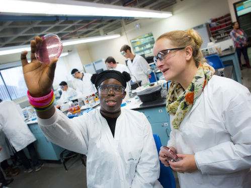 Nneoma V. Nsofar (SEBS '18) with Biochem & Microbiology assistant teaching professor Ines Rauscheubach