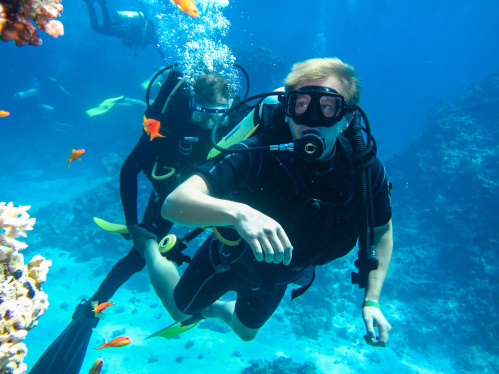 A student scuba diving in the ocean