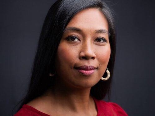 Headshot of Myla Flores (BA’09)
