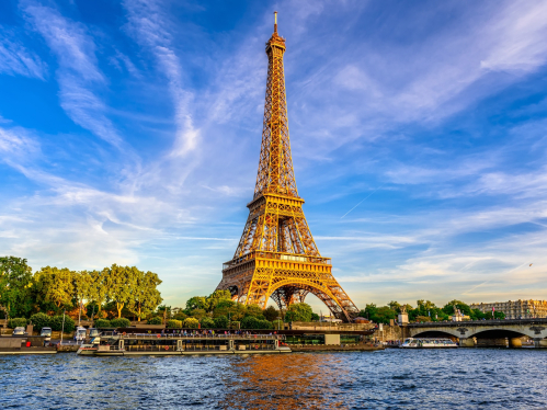 Eiffel Tower and river Seine at sunset in Paris, France.