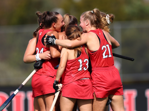 Women’s field hockey team celebrates a score during game vs. Iowa in Piscataway 