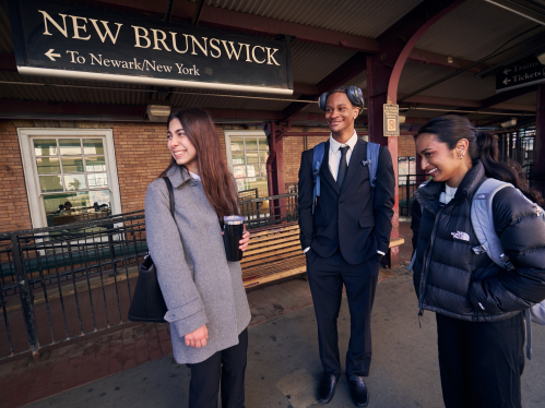Isabella Esposito, Vedika Kulkarni, and Stephan Riche waiting for the train at the New Brunswick Train Station