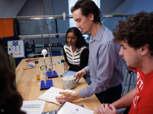 faculty with students in an engineering class