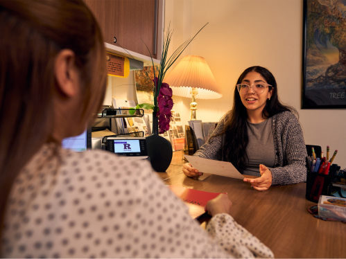 female student with an advisor
