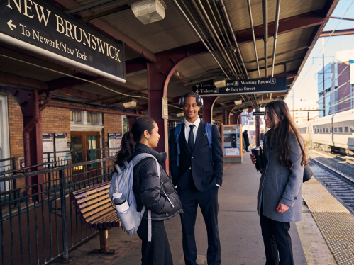 students at the train station
