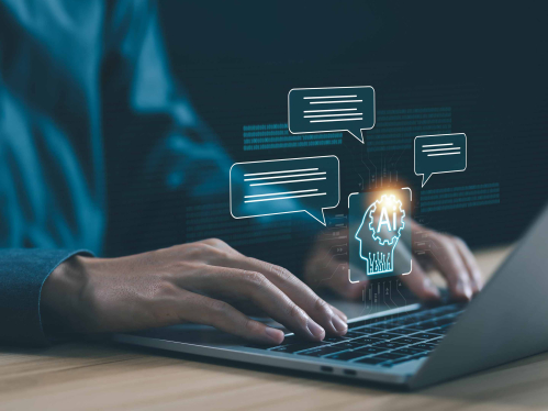 a person typing on a computer showcasing AI capabilities
