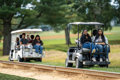 Rutgers Honors College students rode golf carts to travel from experimental plot to plot on Adelphia Farm.