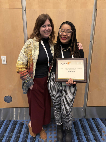 Lauren Kelly poses with AERA award