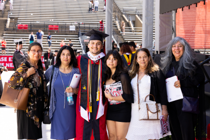 Rutgers University Student Assembly President Christopher Godoy with his mother (left), sister (right) and aunts at the 260th commencement