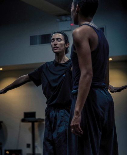 Marla Phelan (left) works with dancer Eleni Loving during rehearsal.