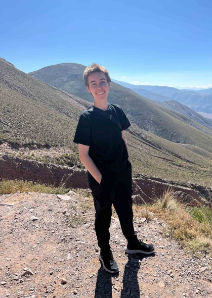 Rutgers alum Jay Schroepfer stands before a mountain vista in the province of Jujuy in northwest Argentina in April.