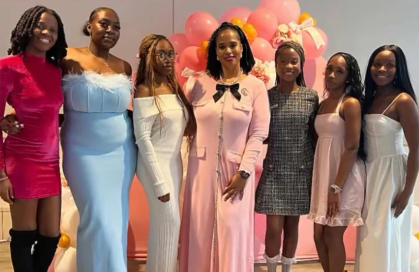 Latisha Lubega (left) poses with other members of the United Black Council during an event.