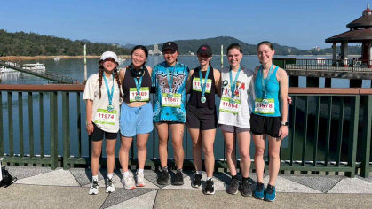 Pauline Kung (third from left) and other English teachers completed the Sun Moon Lake 12K run in Sun Moon Lake in Yuchi Township, Nantou County, Taiwan.