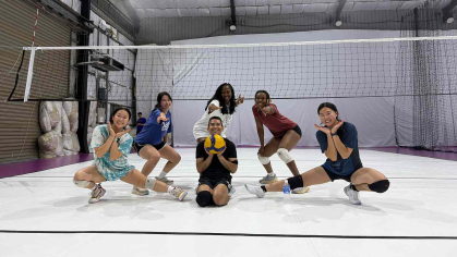 Pauline Kung (right) played as a member of a club team for the Never-ending Volleyball Academy in New Taipei City, Taiwan. 