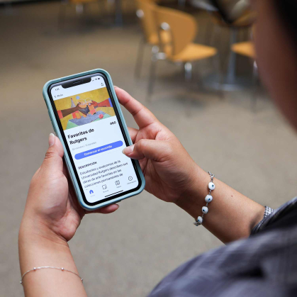 Jessie Garcia shows how the Bloomberg Connects phone app provides an interactive multilingual digital guide for museum visitors.