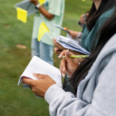 Rutgers Honors College students evaluate experimental turfgrass varieties on Adelphia Farm.